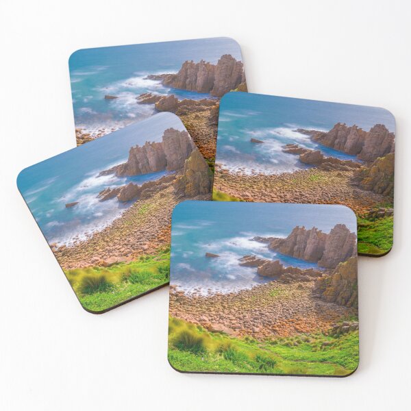 Item preview, Slow moving waves crashing on a beach with mysterious rock formations designed and sold by DesignBoard Photography.