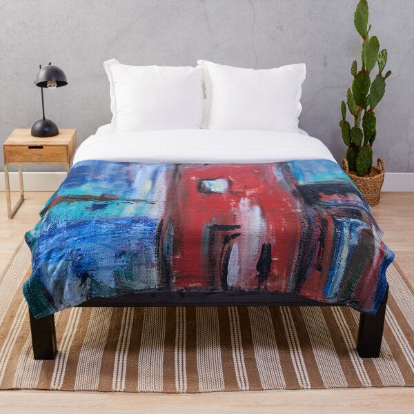 Red tower by the sea Throw Blanket