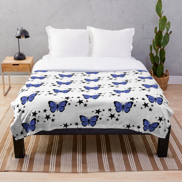 Aperçu de l'œuvre Papillon bleu Étoiles rayonnantes noires créée et vendue par emroccs.