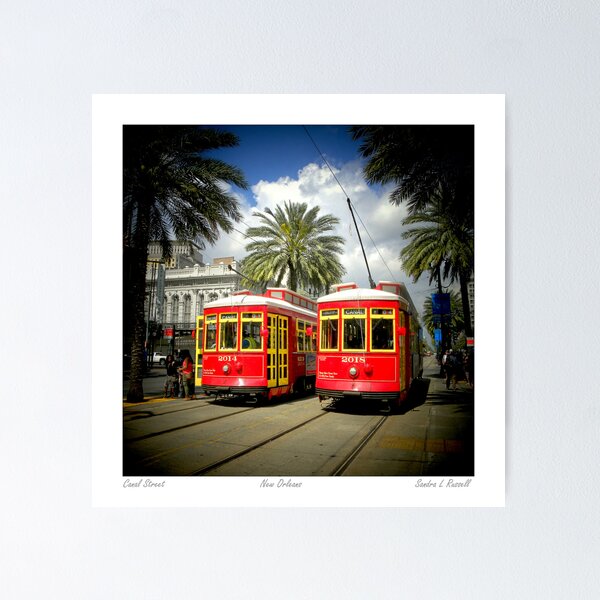 Artikelvorschau,  Red Trolly Cars On Canal Street entworfen und verkauft von Sandra Russell.
