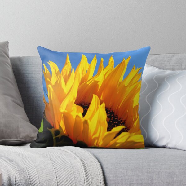 Sunflower against a blue sky Throw Pillow