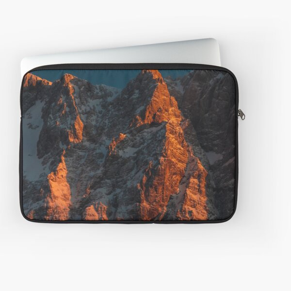 Sunset light on majestic mountains Laptop Sleeve