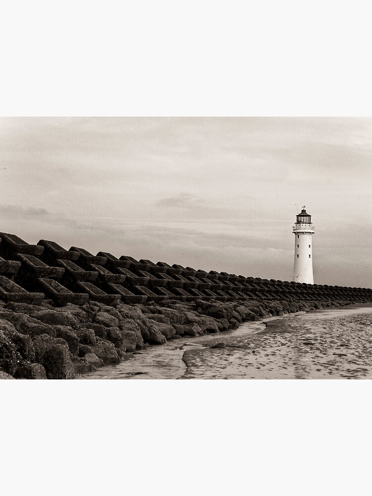 Lighthouse and seawall by bcash