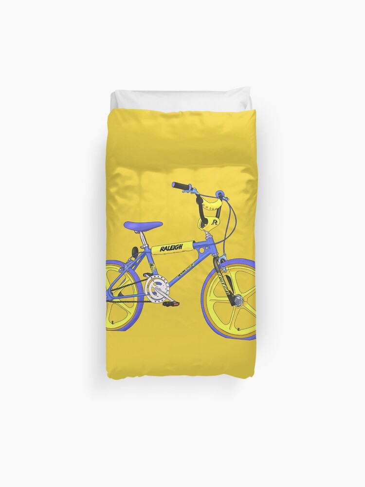 yellow raleigh bike