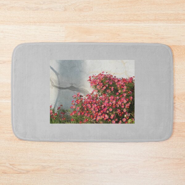 Item preview, Pink Flowers Against a Gray Stucco Wall designed and sold by pixelmountain.
