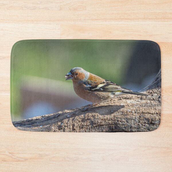 Item preview, Chaffinch resting on a branch with a seed in its beak designed and sold by brambillasimone.
