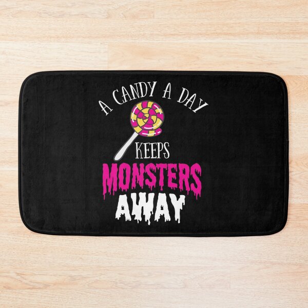 Item preview, Halloween Shirt Candy A Day Keeps The Monsters Away Gift Tee designed and sold by haselshirt.