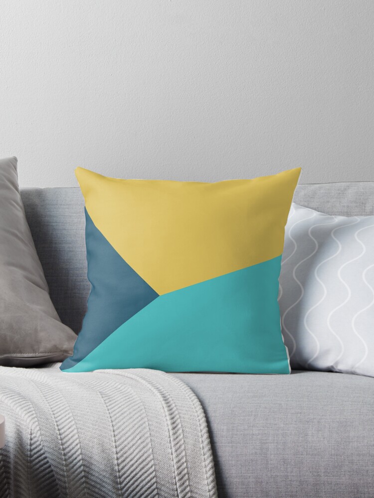 Teal and yellow accent outlet pillows