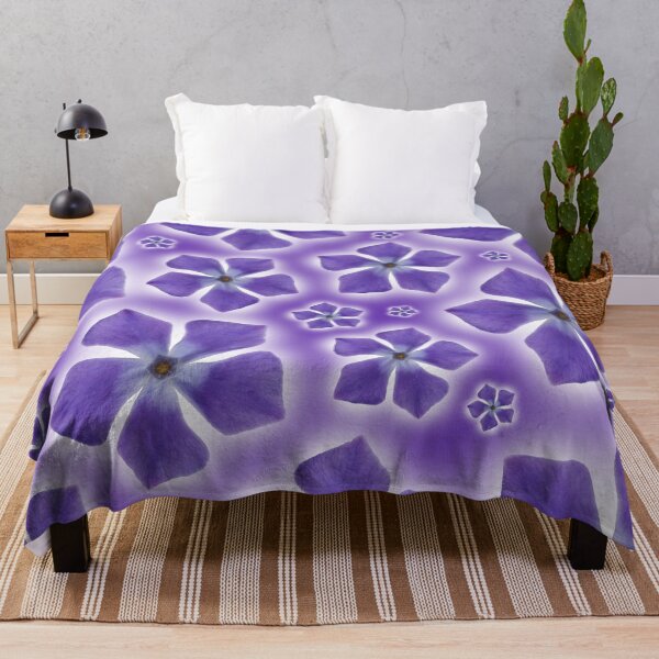 Item preview, A pattern of isolated Periwinkle blossom on a purple designed and sold by Phillip Thornton.