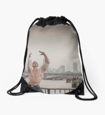 Dramatic Sky with Hot Model on the Thames in London Mark in colour Drawstring Bag