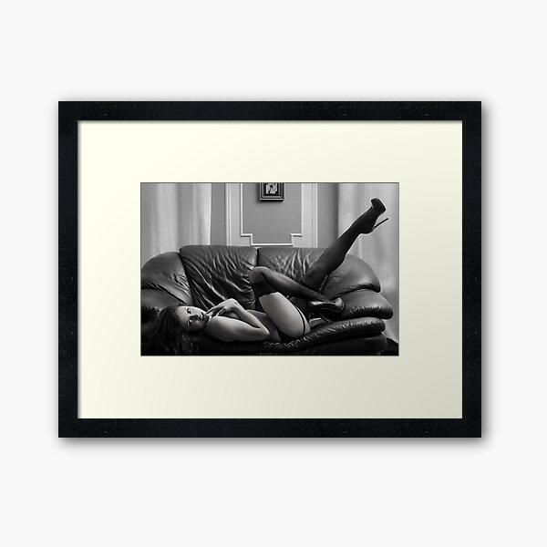 A young topless brunette woman posing sexy in lingerie Framed Art Print