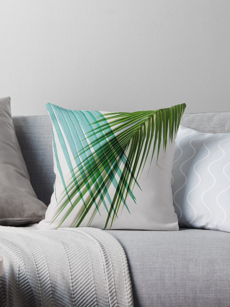 Tropical leaf outlet throw pillows