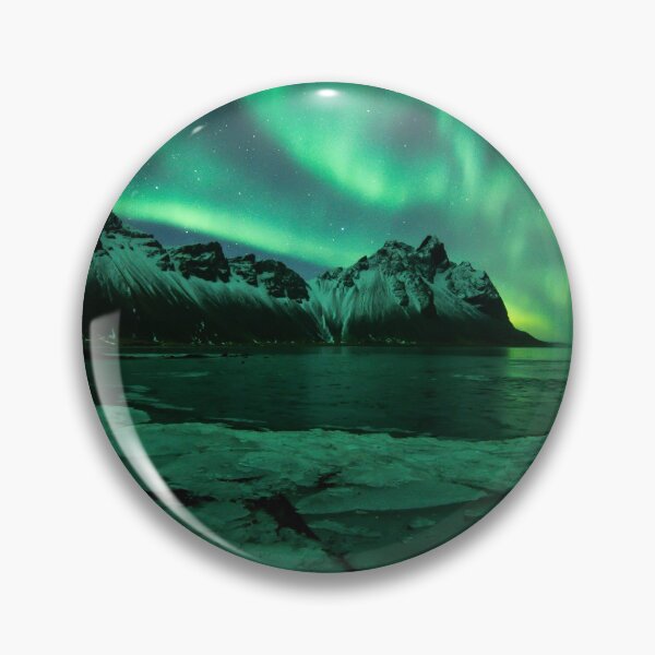 Item preview, Northern lights Iceland above Vestrahorn mountain in Stokksnes with ice in the foreground designed and sold by michieldros.