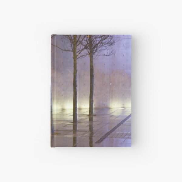 Passage of time in a concrete jungle Hardcover Journal