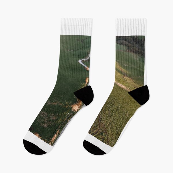 Item preview, Road in a green field as seen from above designed and sold by MarioGuti.
