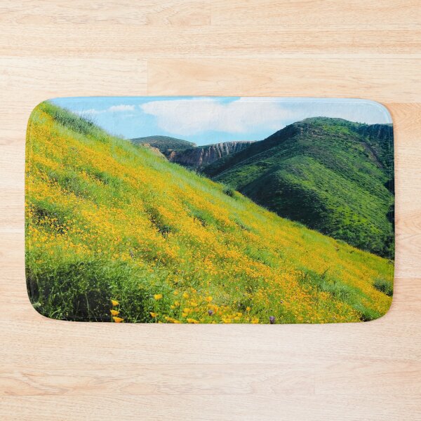 Item preview, yellow poppy flower field with green leaf and green mountain and cloudy blue sky in summer designed and sold by Mrvell.