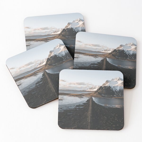 Item preview, Icelandic road leading to Stokksnes (Vestrahorn) peninsula with snowy mountains in the background. designed and sold by michieldros.