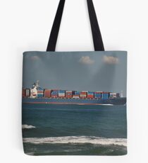 ship in channel near shore Tote Bag