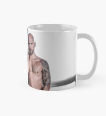 Taking a shower in the water the pours down the wall of the River Thames in London with Valdii Mug