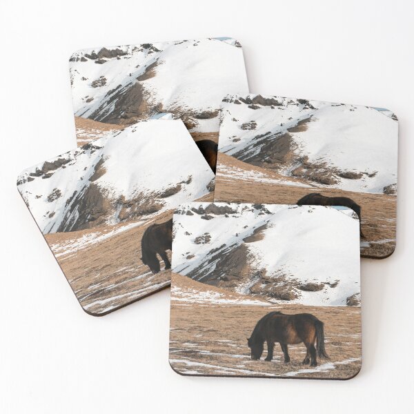 Item preview, Brown Icelandic horse in snowy green valley in Iceland designed and sold by michieldros.