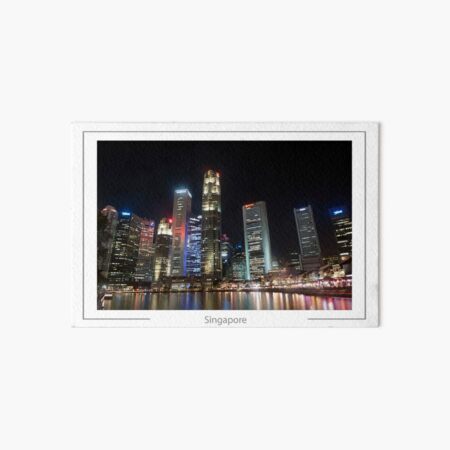 Artikel-Vorschau von Die Wolkenkratzer des Geschäftsviertels von Singapur spiegeln sich nachts im Singapore River., designt und verkauft von Richard Wareham.