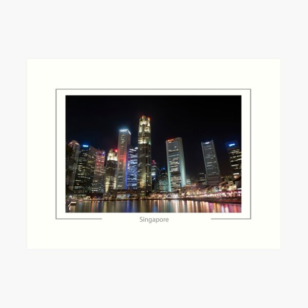 Singapore Skyscrapers of the business district reflected in the Singapore River at night. Art Print