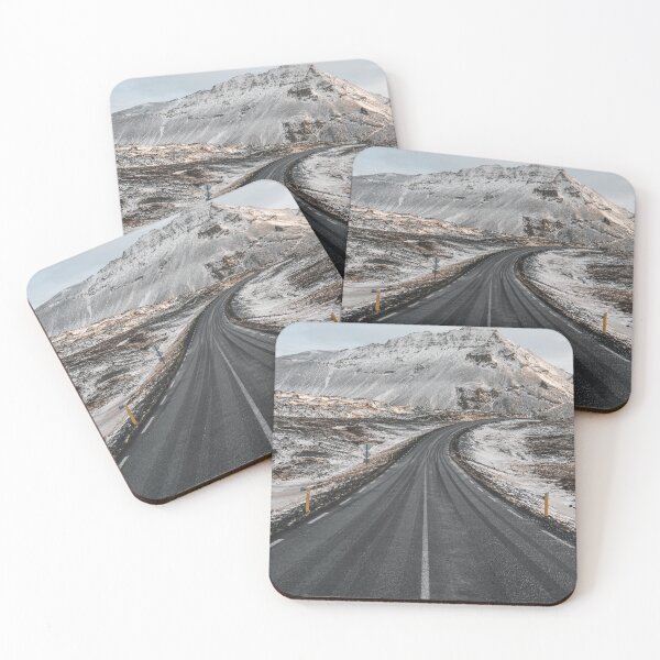 Item preview, Icelandic road crossing the snowy mountains in the early morning in the Snaefellsnes peninsula designed and sold by michieldros.
