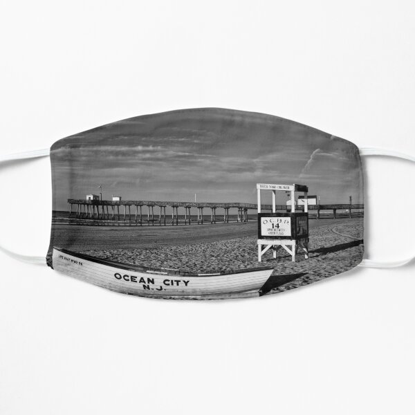 A Beach Scene In Black And White Mask
