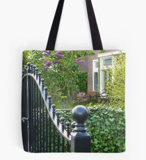 huge gate, small garden Tote Bag