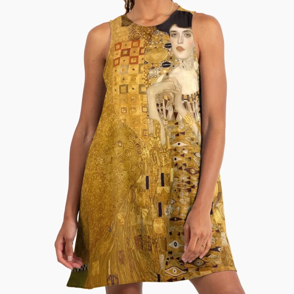 woman in a gold dress Paros Maxi Dress ~ Pleated Gold – Show Me Your Mumu main image 0