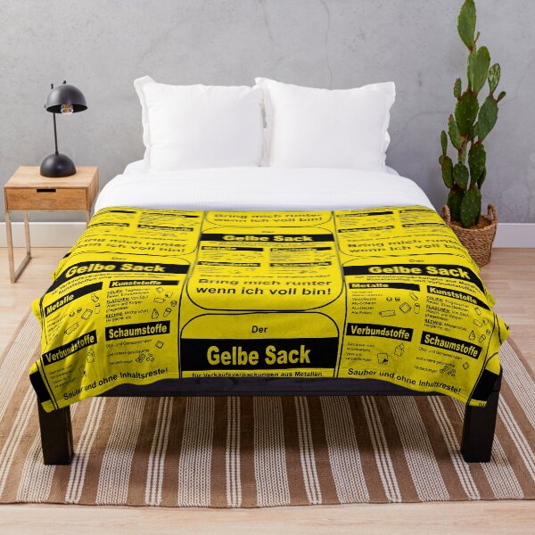The yellow bag Throw Blanket