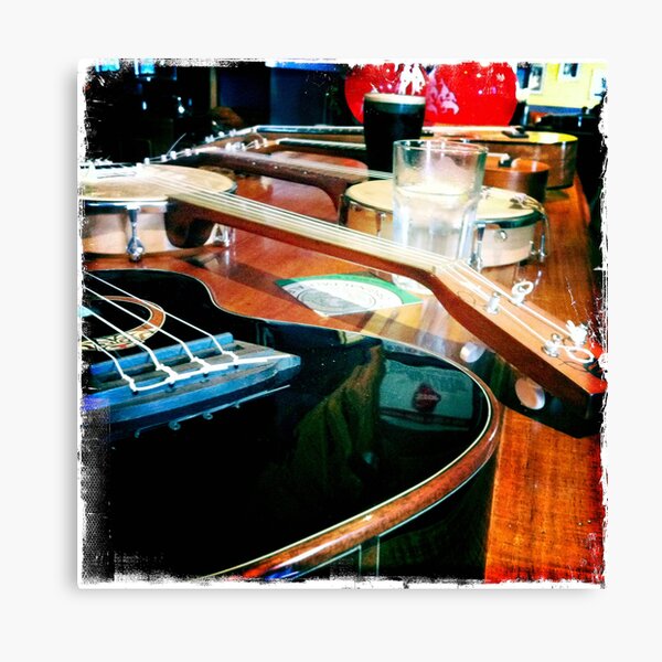 Ukuleles on a bar Canvas Print