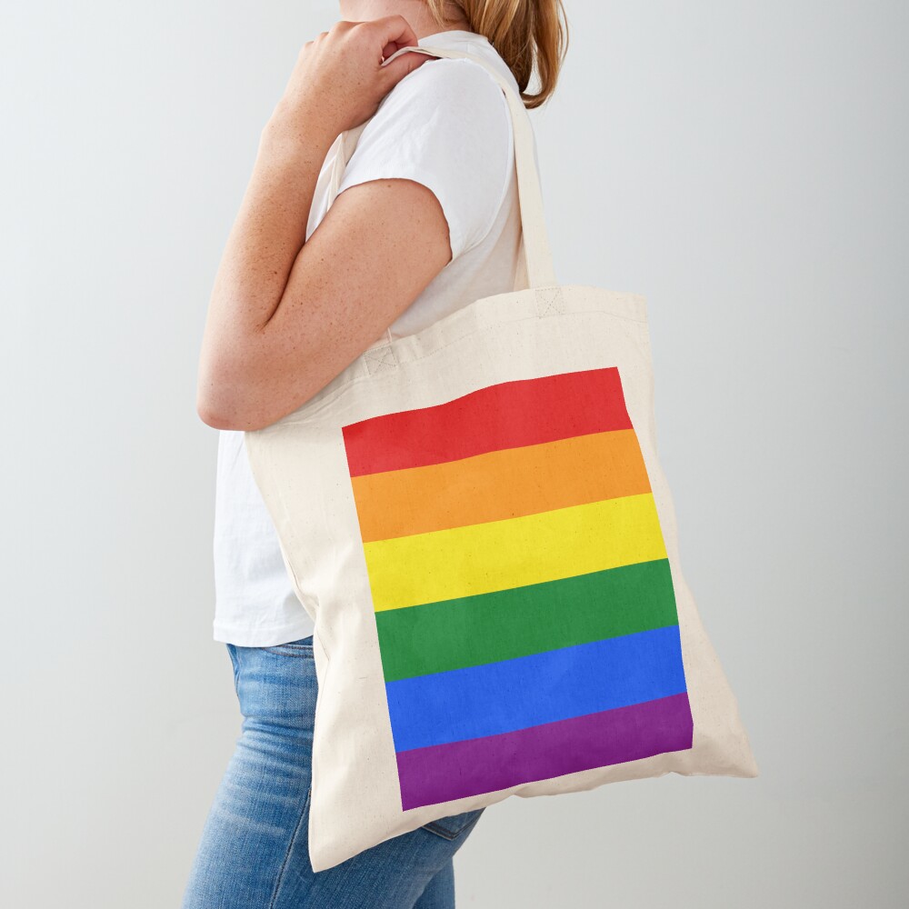 LGBTQ Pride Rainbow Flag Tote Bag in a Hand Stock Image - Image of