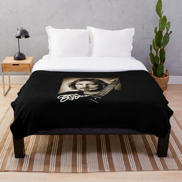 Four Stringed Man Throw Blanket