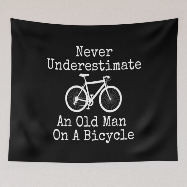 Item preview, Never Underestimate An Old Man On a Bicycle designed and sold by CatMonkStudios.