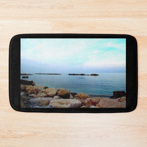 Item preview, Calm Adriatic sea surrounded by massive rocks under the light blue sky designed and sold by Kristina Drozd.