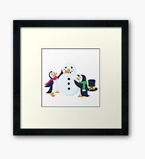 Snowman penguins Framed Print