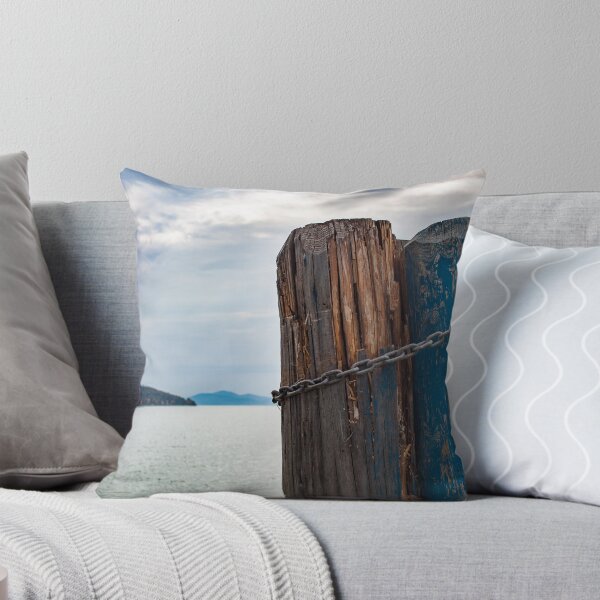 Item preview, Wood pillars wrapped in a chain on a lake in Italy. Island in the background dramatic blue skies great gift ideas for your traveling bestie  designed and sold by g2rdsmith.
