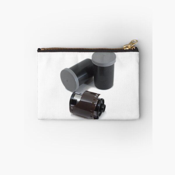 Item preview, 35mm Film Canisters Against a White Background designed and sold by rodmacpherson.