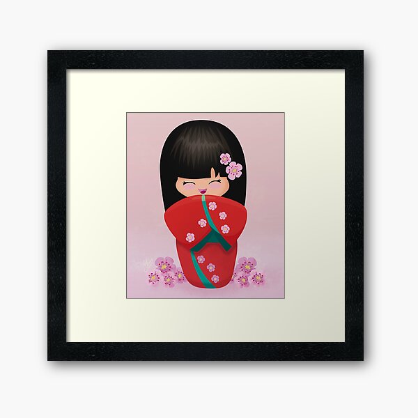 Kokeshi rodeada de flores de cerezo Lámina enmarcada