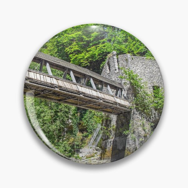 Item preview, Pedestrian bridge crossing wild river with old mill building designed and sold by Grégory DUBUS.