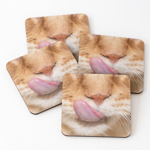 Item preview, Detail of the muzzle of a Maine Coon cat sticking its tongue out designed and sold by brambillasimone.