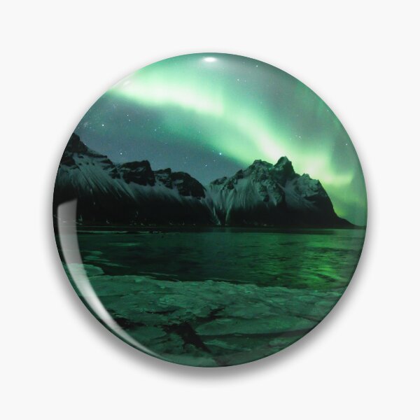 Item preview, Northern lights above Vestrahorn mountain in Stokksnes, Iceland with ice in the foreground designed and sold by michieldros.