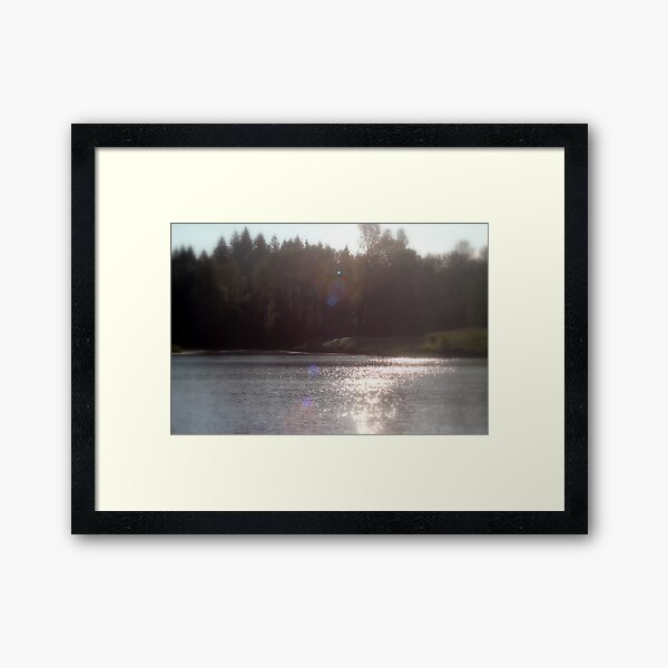 view across Trojan pond, near Goble, Oregon with flare Framed Art Print