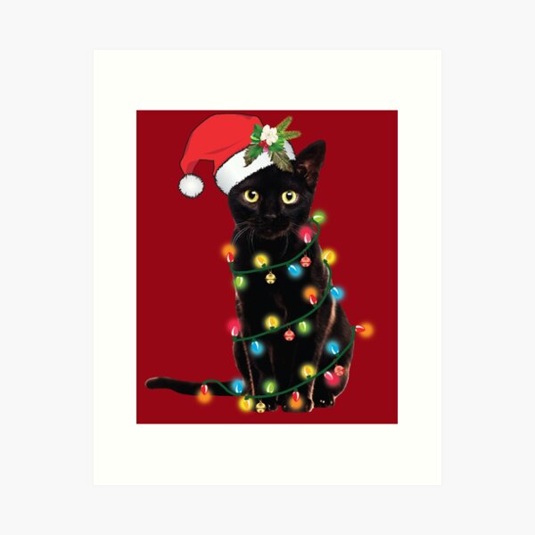 Schwarze Katze des Weihnachtsmannes verheddert sich im Weihnachtsbaum beleuchtet Feiertag Kunstdruck