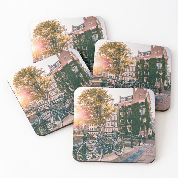 Item preview, Bicycle (bike) on a bridge in Amsterdam with Dutch house covered green plants during sunset designed and sold by michieldros.