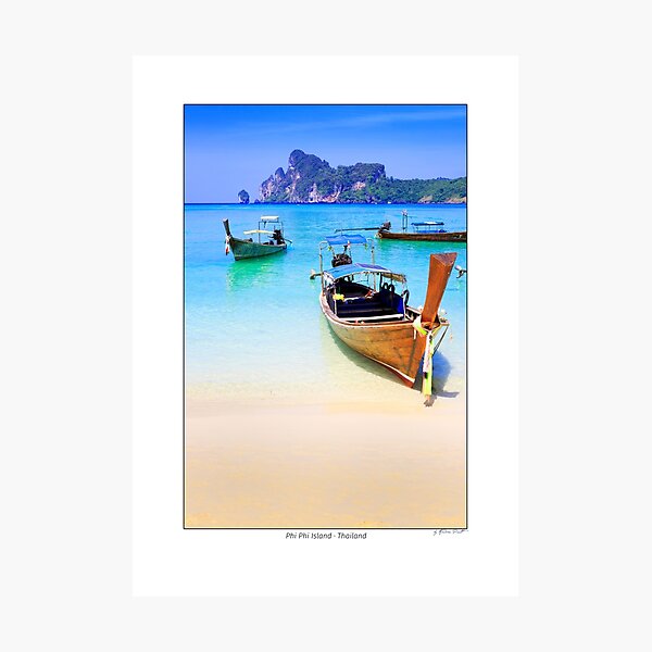 Typical Thai longtail boats in Dahlam Bay on Phi Phi Island, Thailand. Photographic Print