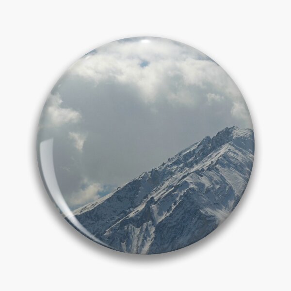 Item preview, Rugged snow-covered mountain covered with storm clouds. designed and sold by EAnneH.