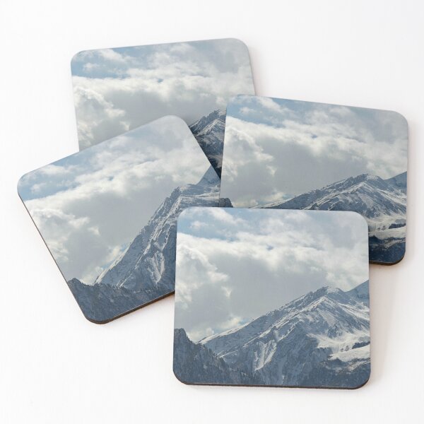 Item preview, Rugged snow-covered mountain covered with storm clouds. designed and sold by EAnneH.