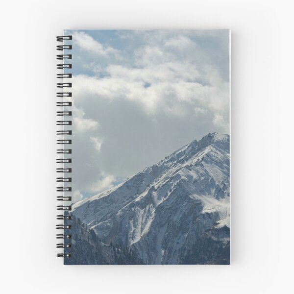 Item preview, Rugged snow-covered mountain covered with storm clouds. designed and sold by EAnneH.